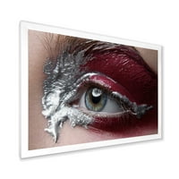 Designart 'Belélkezett egy női szem, piros sminktel a' Modern keretes művészeti nyomtatás